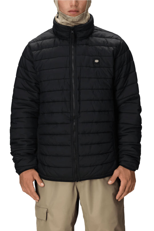 person wearing black snowboard jacket