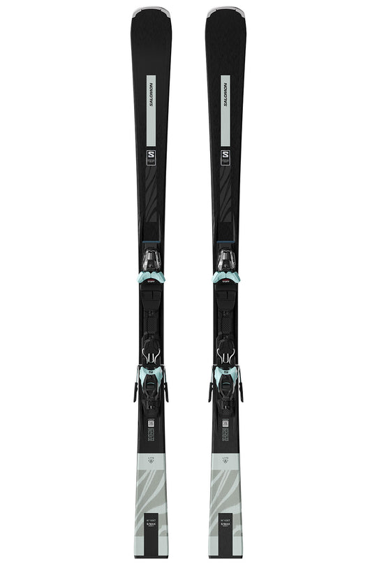 Pair of black skis with bindings on a white background