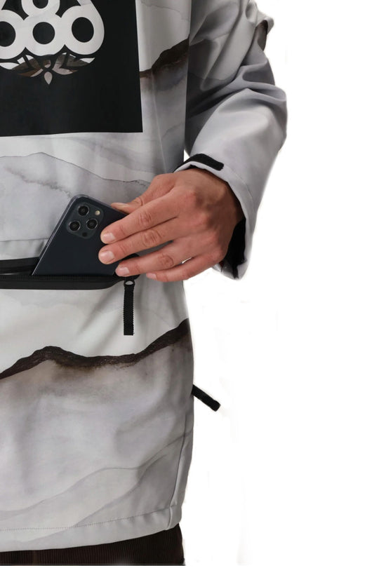 person wearing a 686 hoody with a mountain graphic