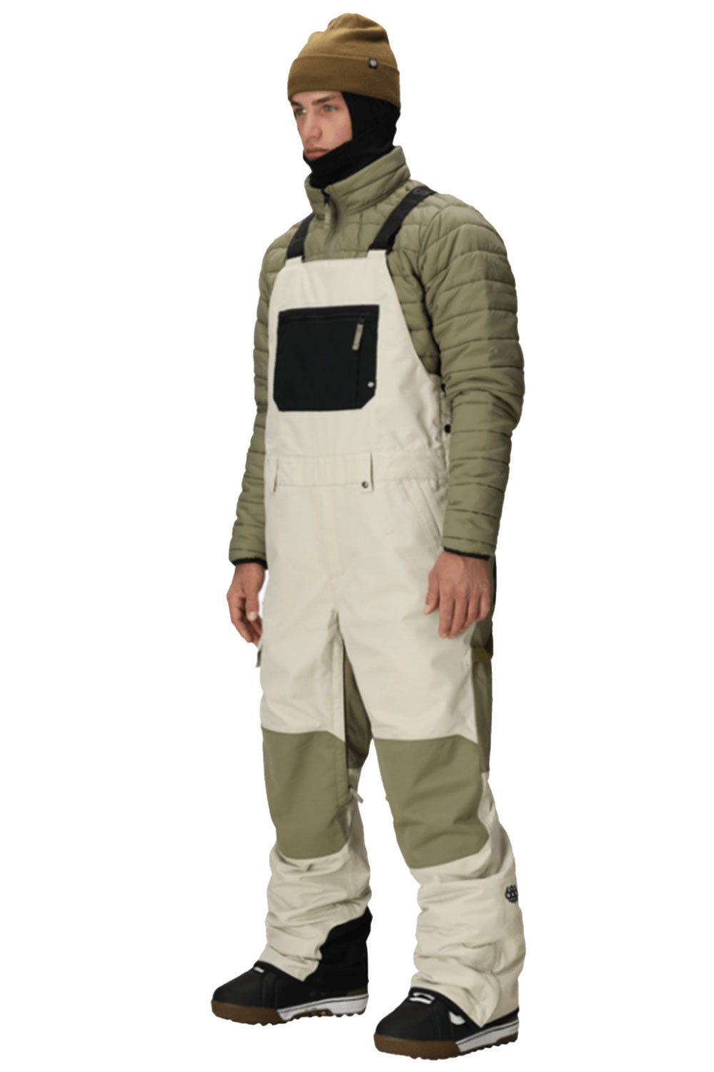 person wearing snow bib overall pants