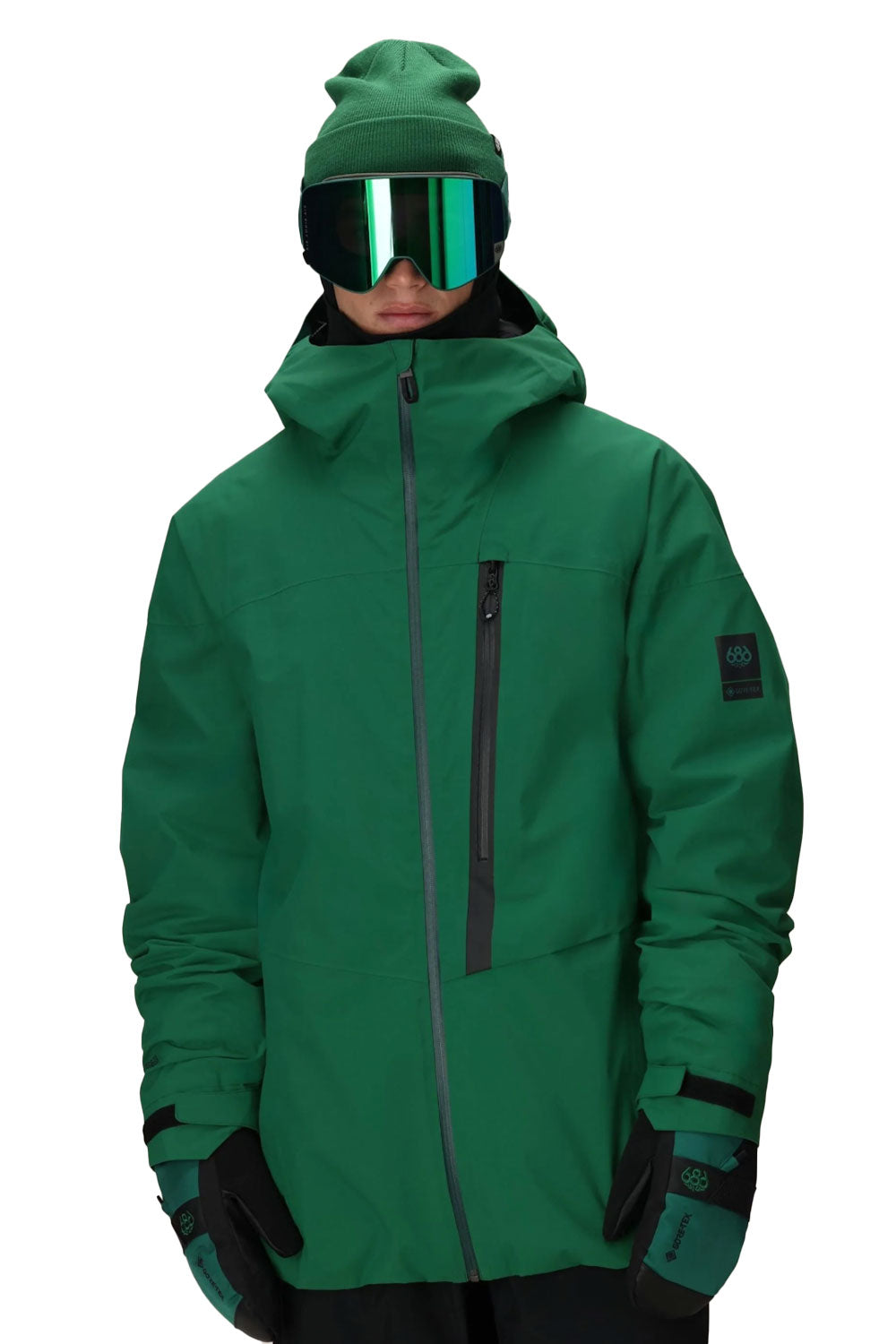 person wearing a green snowboard jacket
