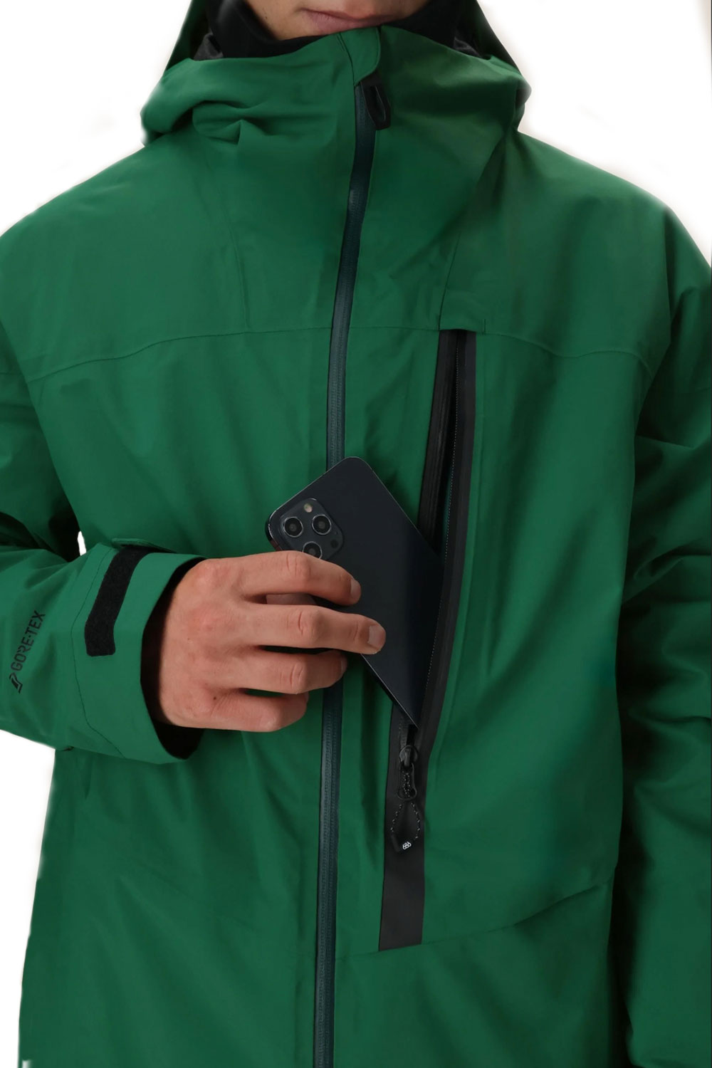 front pocket detail of a green snowboard jacket