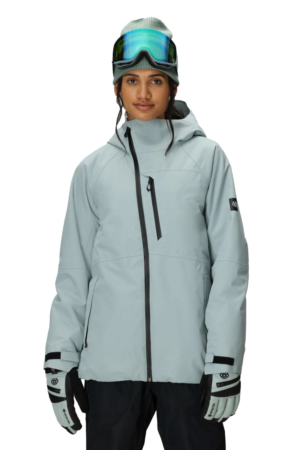 a person wearing a light blue snowboard jacket