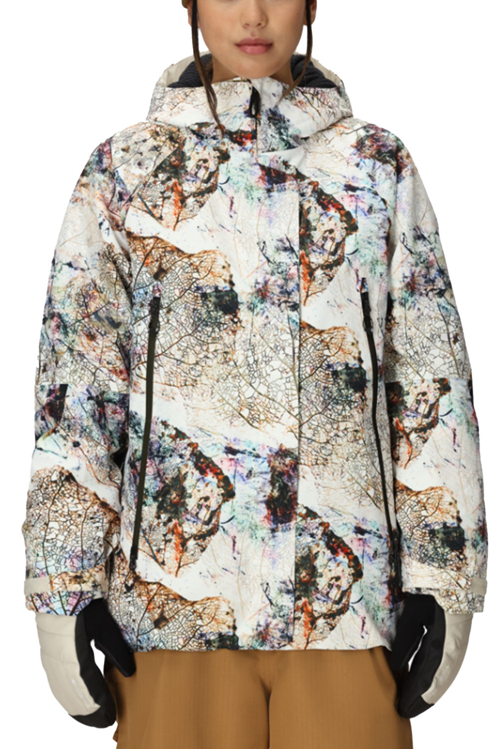 Person wearing a colorful patterned jacket with gloves on a white background