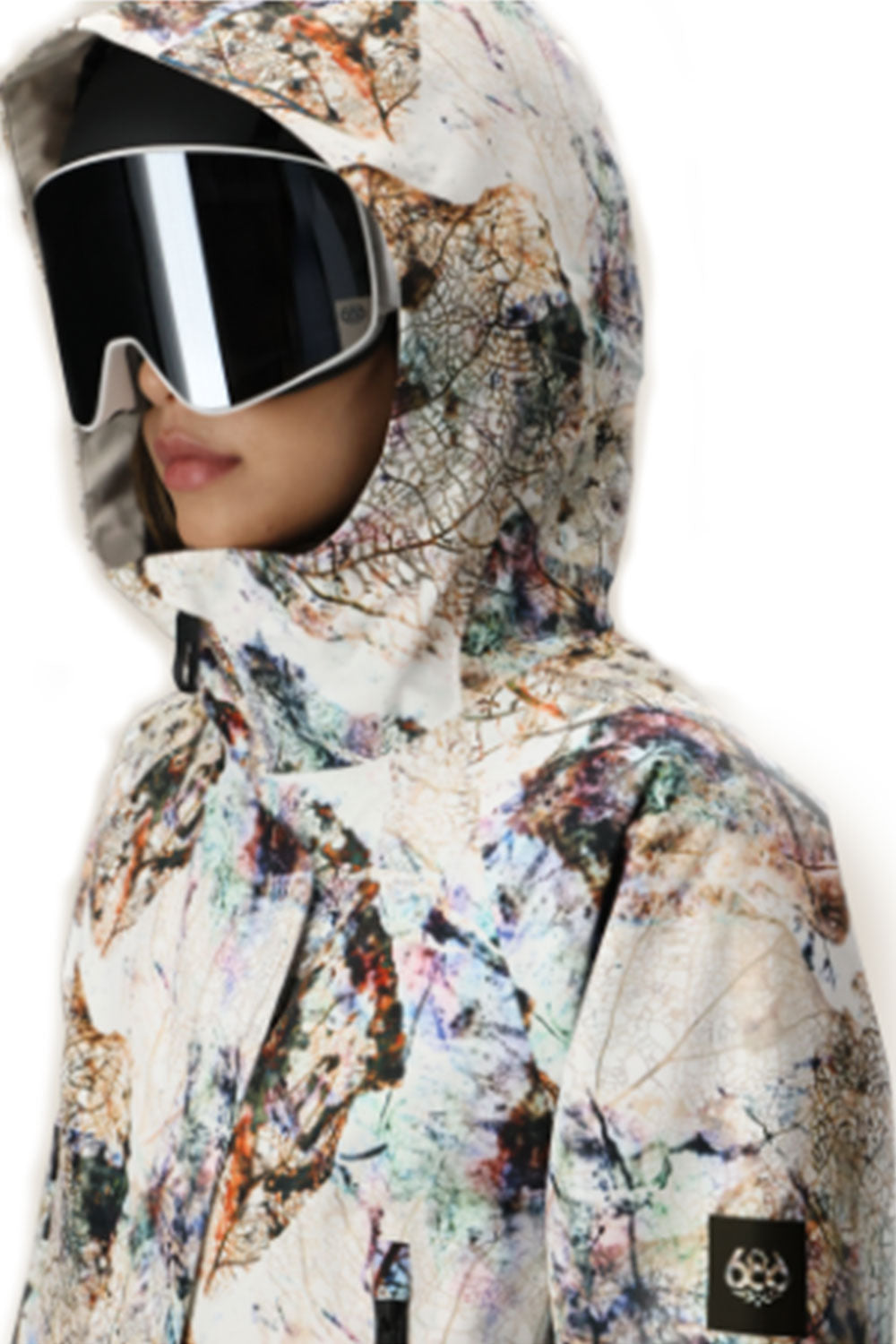 Person wearing a colorful hooded jacket with reflective goggles on a white background