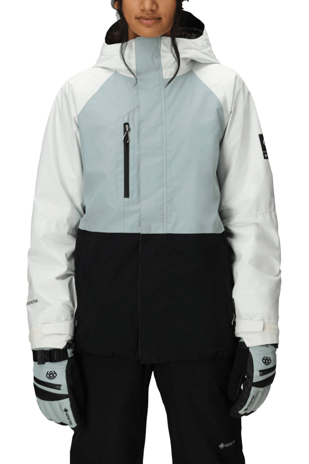 person wearing a blue, white and black colorblock jacket