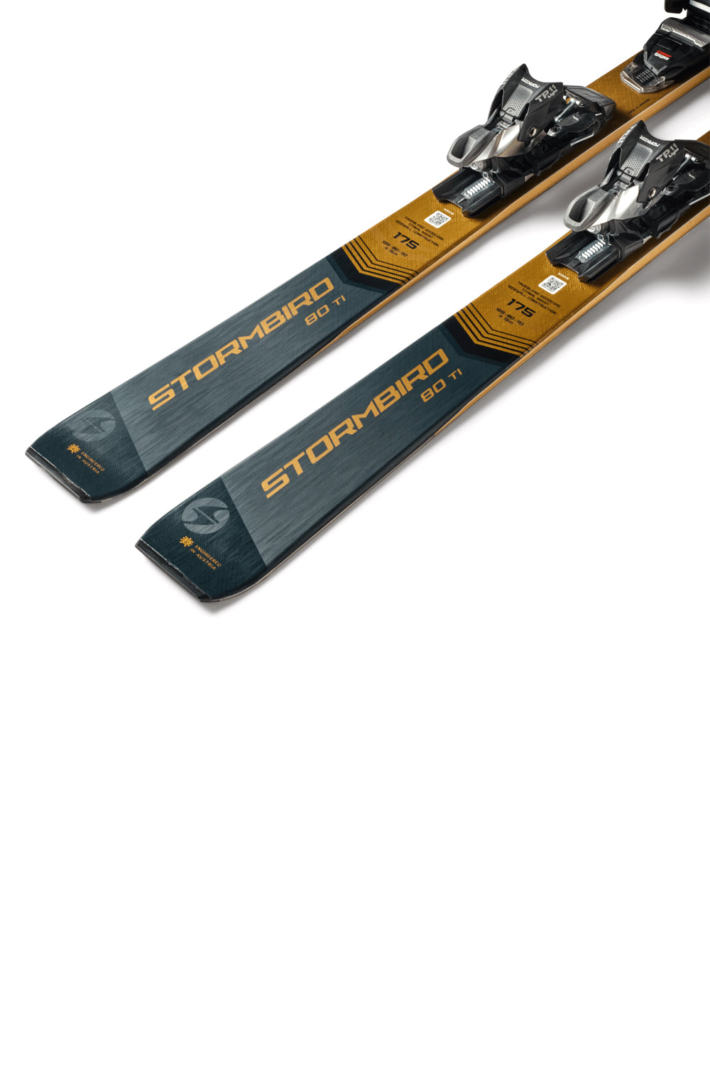 Pair of skis with bindings on a white background
