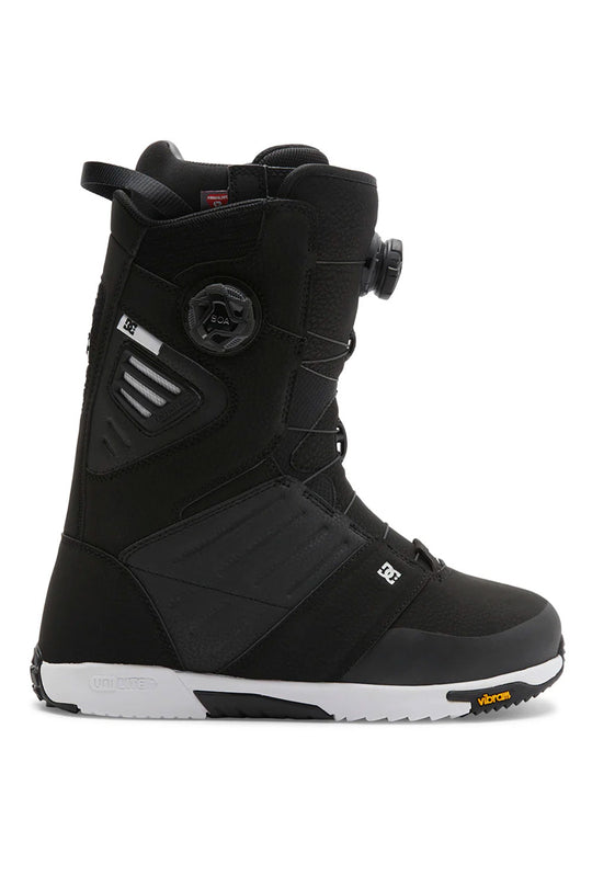 Black snowboard boot with white accents