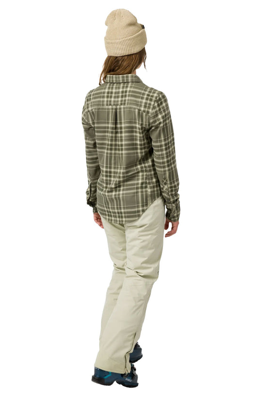 Person wearing a plaid shirt and beige pants on a white background