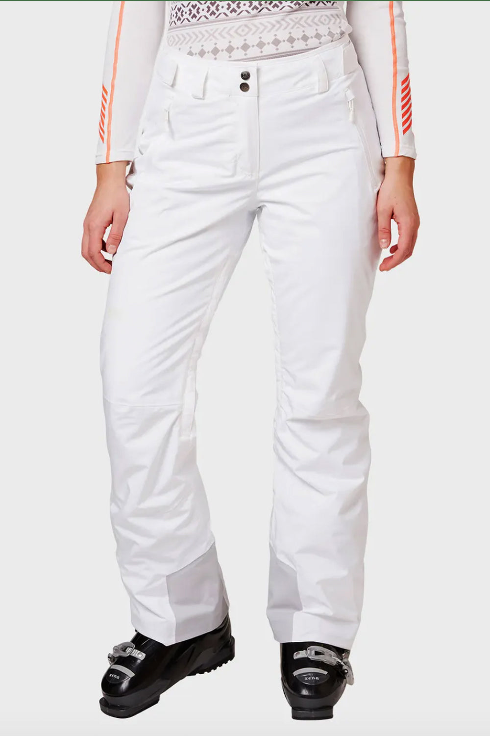 White ski pants worn by a person on a white background