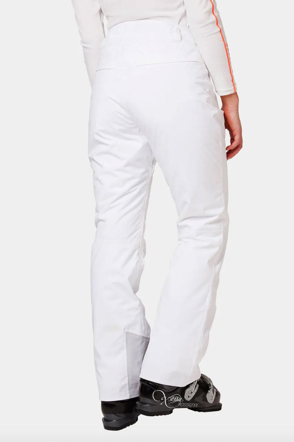 White equestrian pants worn by a person on a white background