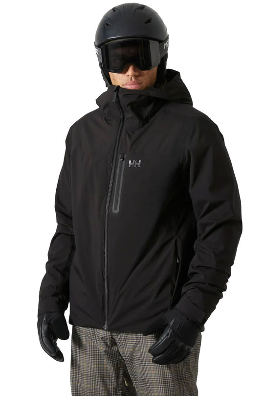 Person wearing a black jacket, helmet, and goggles on a white background