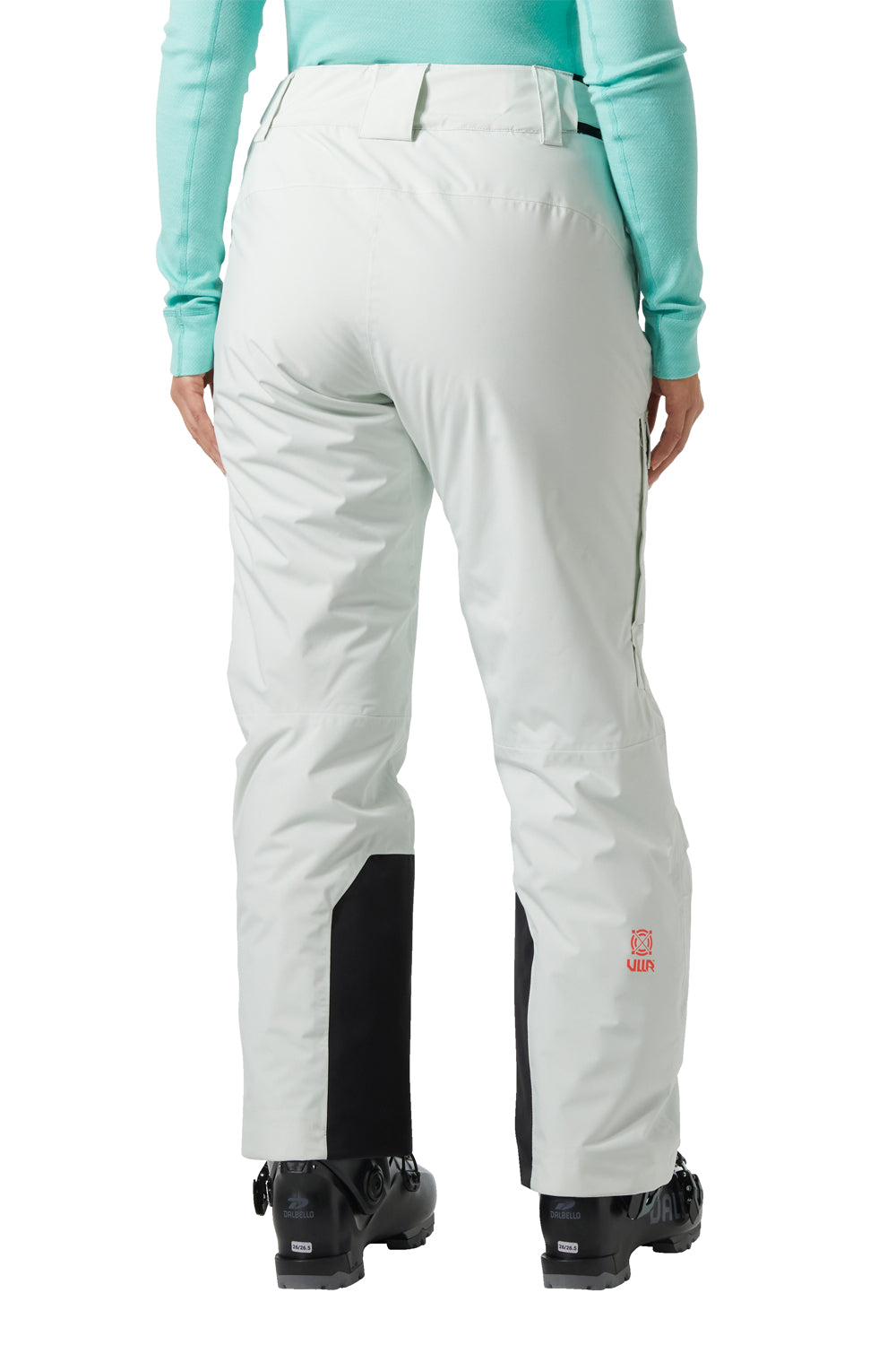 seamfoam green ski pants with black accents worn by a person on a white background