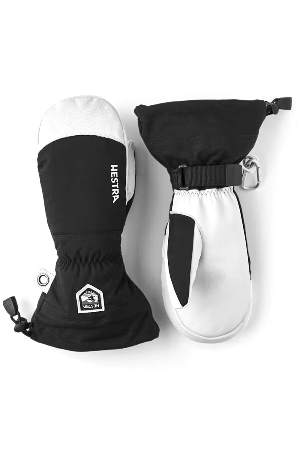 Black and white mitten with Hestra logo on a white background