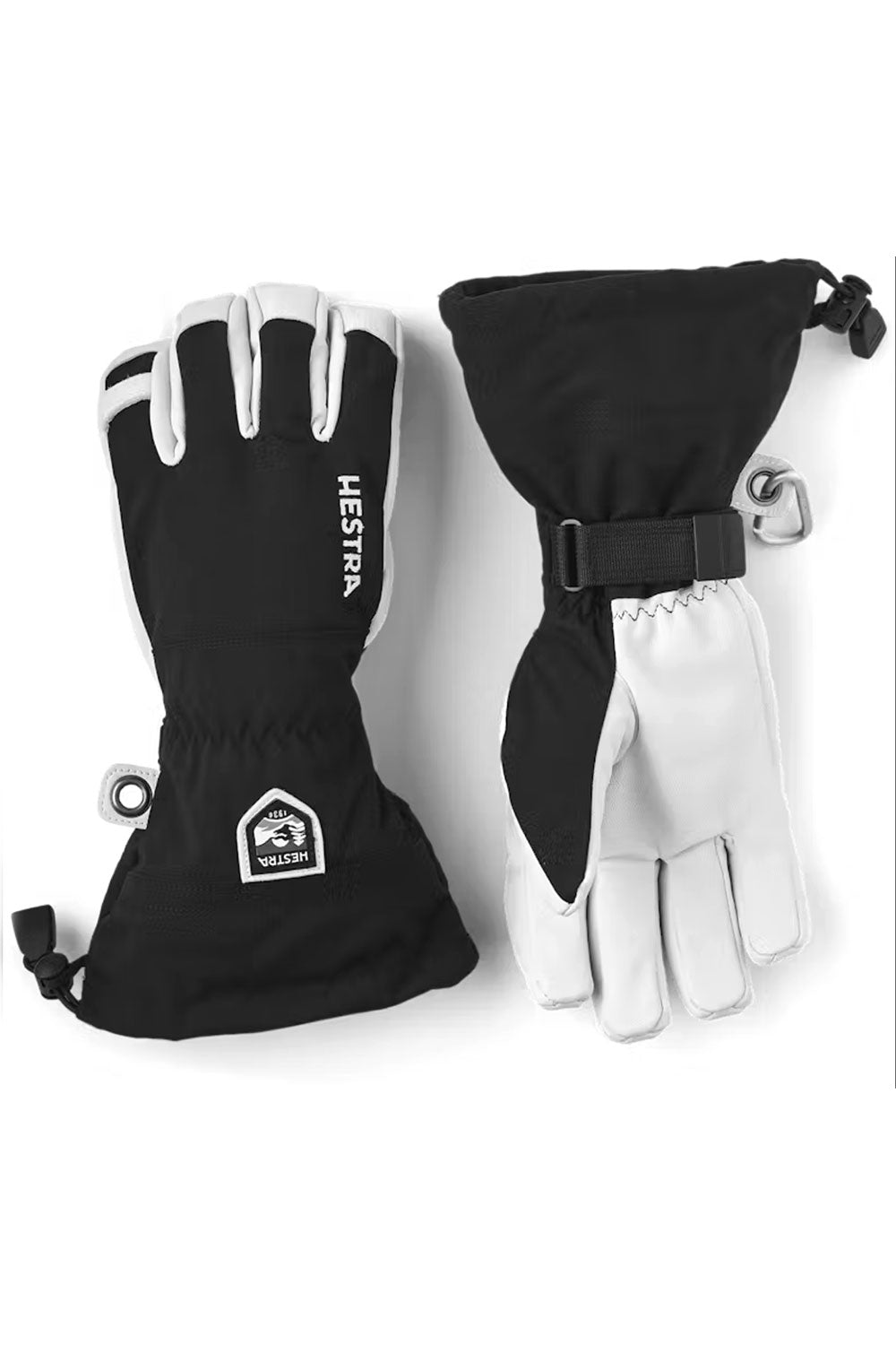 Black and white gloves with Hestra logo on a white background