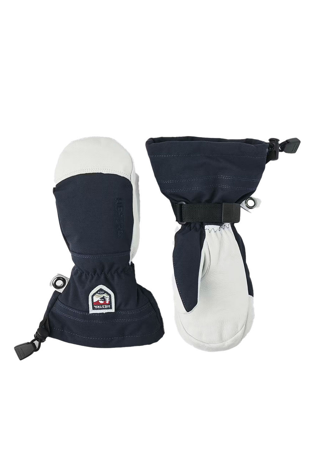 Pair of navy and white mittens on a white background