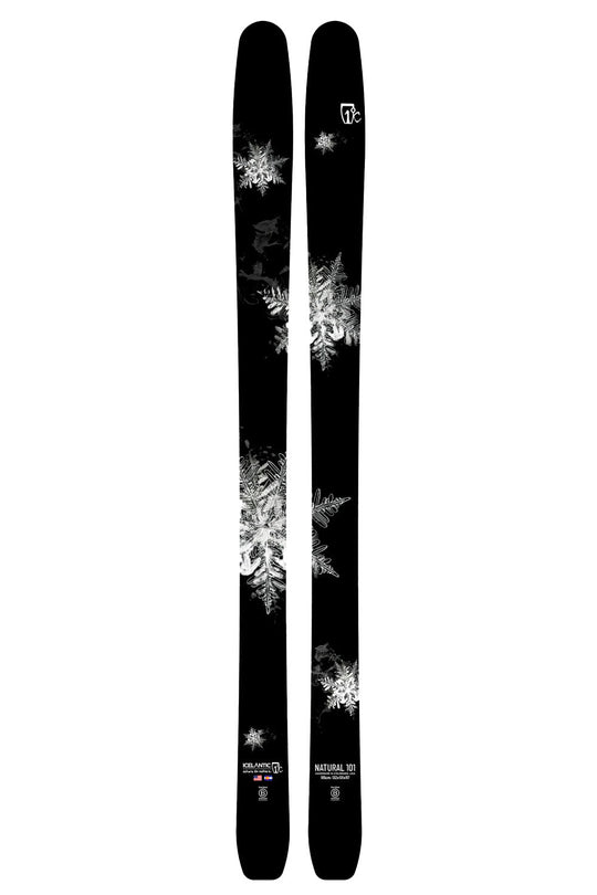 Two black skis with white snowflake patterns on a white background