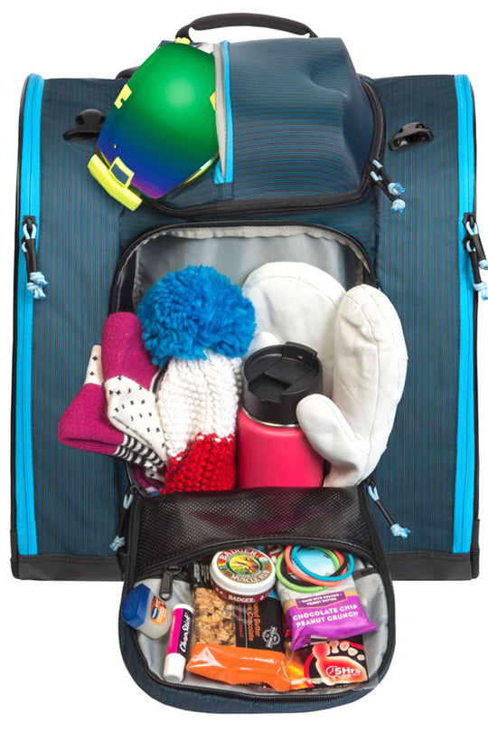 several items in a ski boot backpack