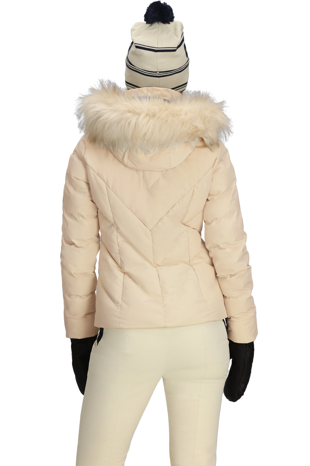 Beige puffer jacket with fur hood, white pants, and black gloves on a white background