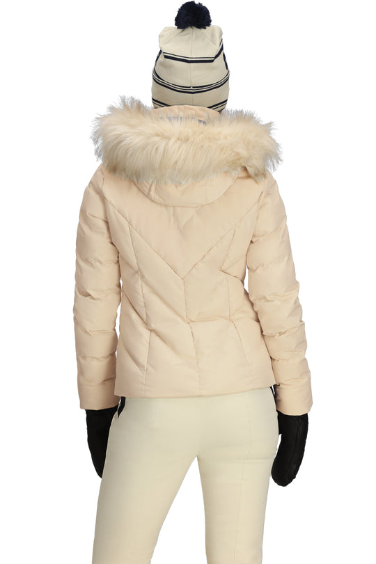 Beige puffer jacket with fur hood, white pants, and black gloves on a white background