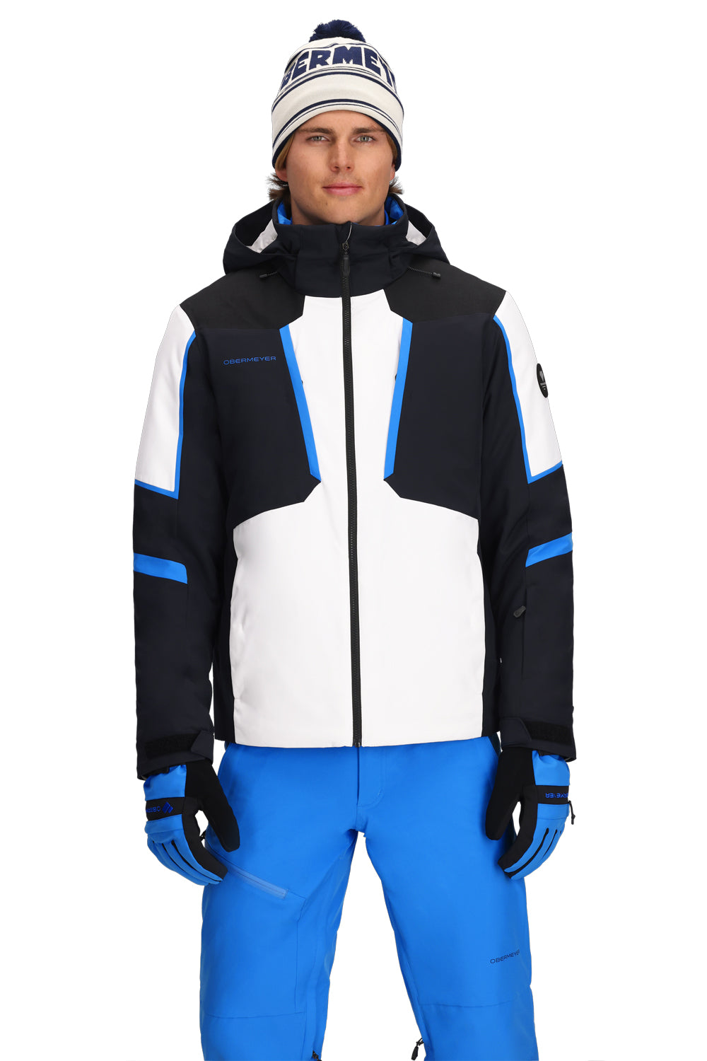 Person wearing a black, white, and blue ski jacket with matching pants on a white background
