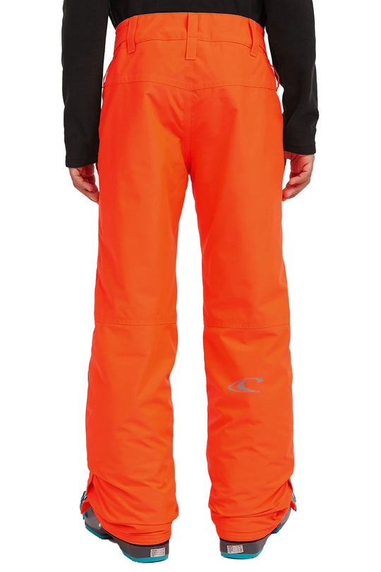 Orange snow pants worn by a person on a white background