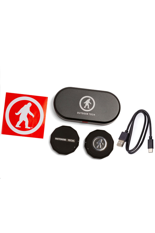 Collection of electronic accessories with 'Outdoor Tech' branding on a white background