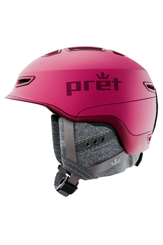 Pink helmet with 'pret' branding on a white background