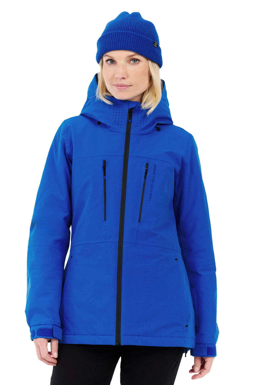 Person wearing a blue jacket and beanie on a white background