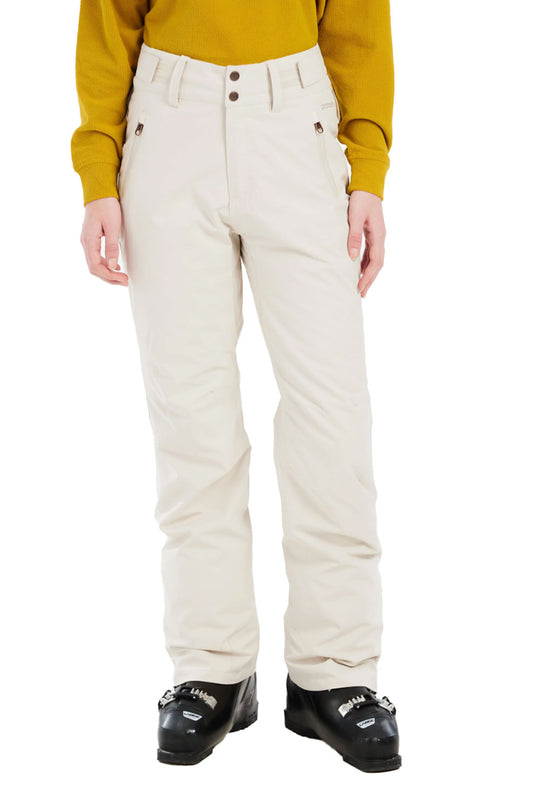 Person wearing cream high-waisted pants with a yellow top on a white background