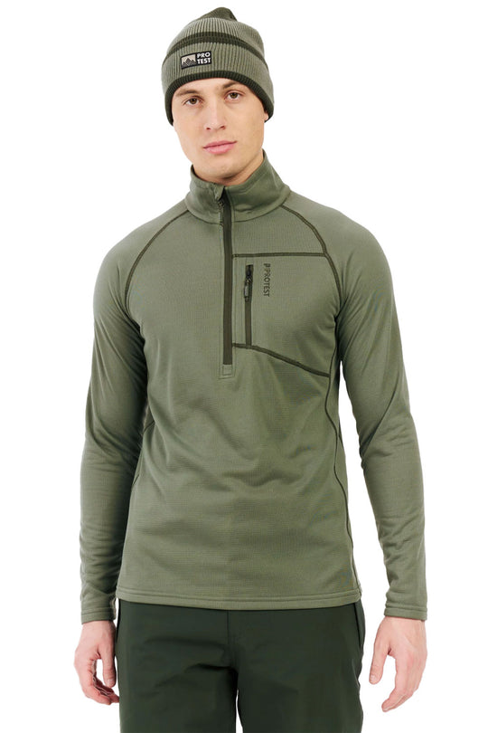 Man wearing a green pullover with a zipper and matching beanie on a white background