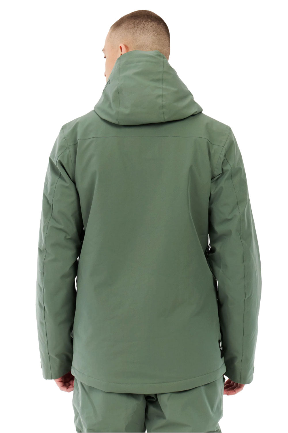 Person wearing a green jacket on a white background