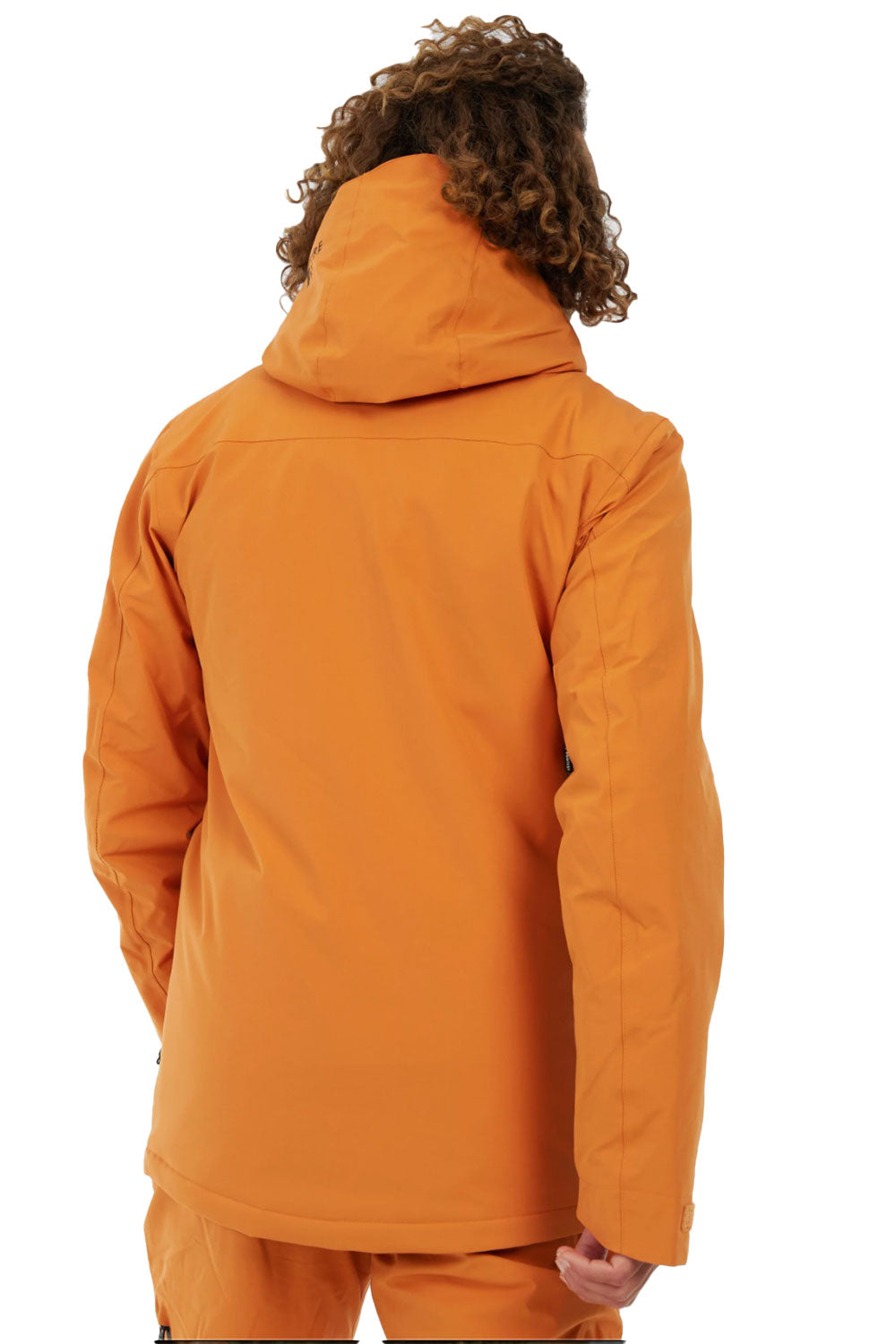 Person wearing an orange jacket and pants on a white background