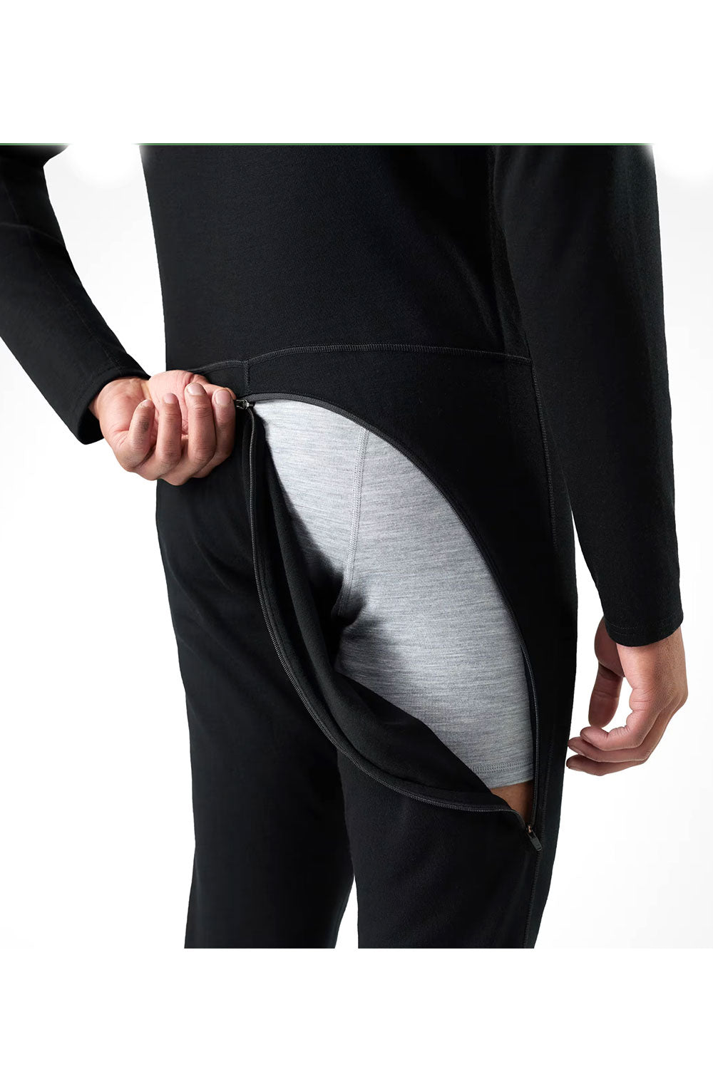 Person wearing a black outfit with a unique design on a white background