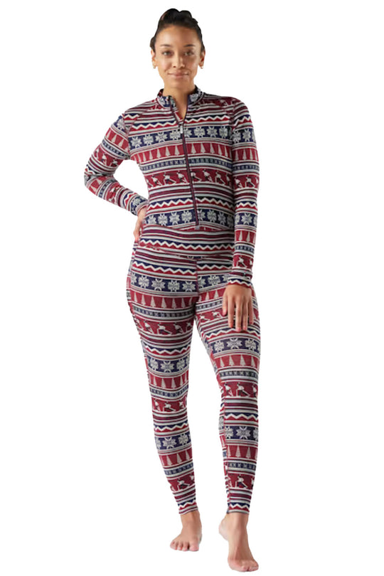 Person wearing a patterned onesie on a white background