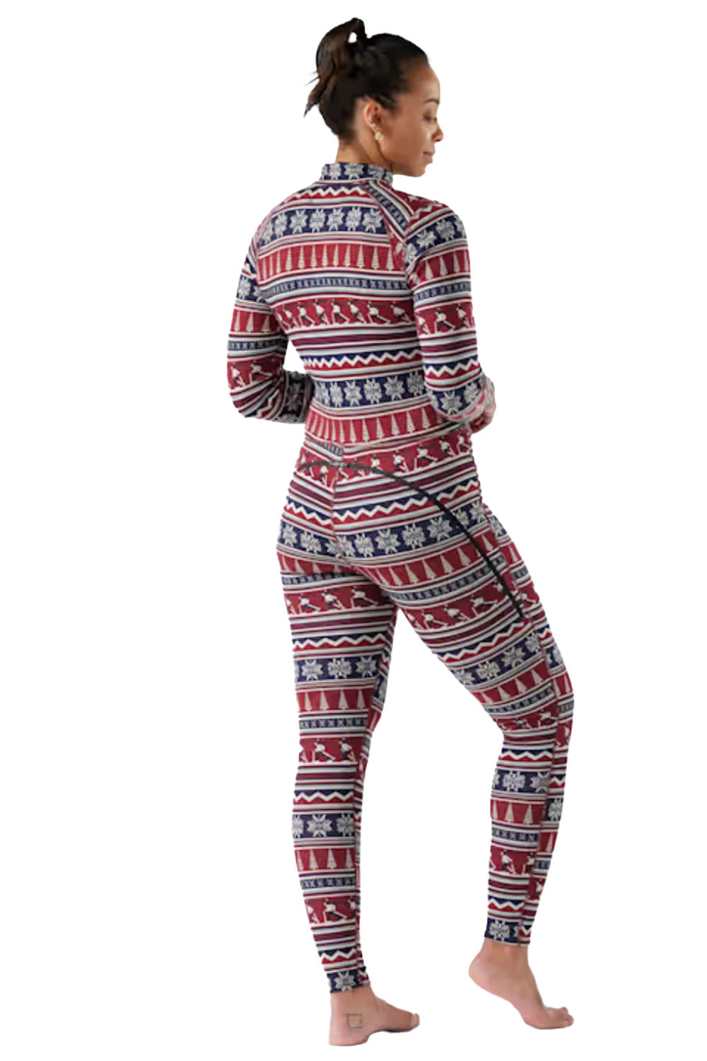 Person wearing a patterned onesie on a white background