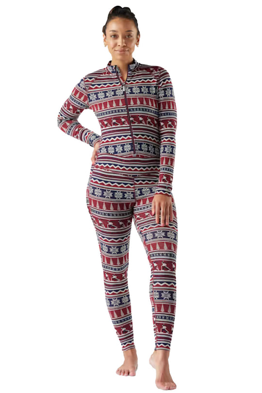 Person wearing a patterned onesie on a white background