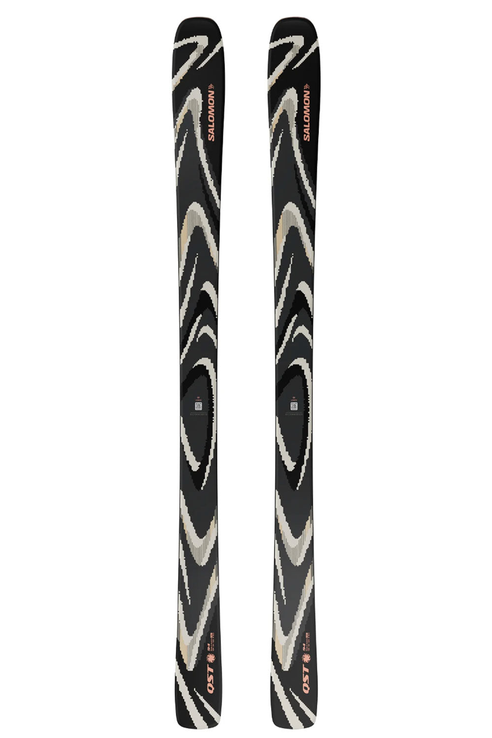 Two black skis with white patterns on a white background