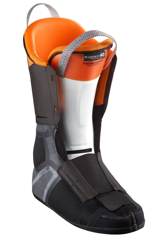 Black and orange ski boot liner with gray accents on a white background