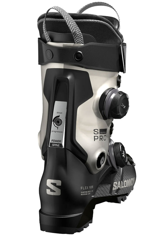 Black and white ski boot with visible branding on a white background