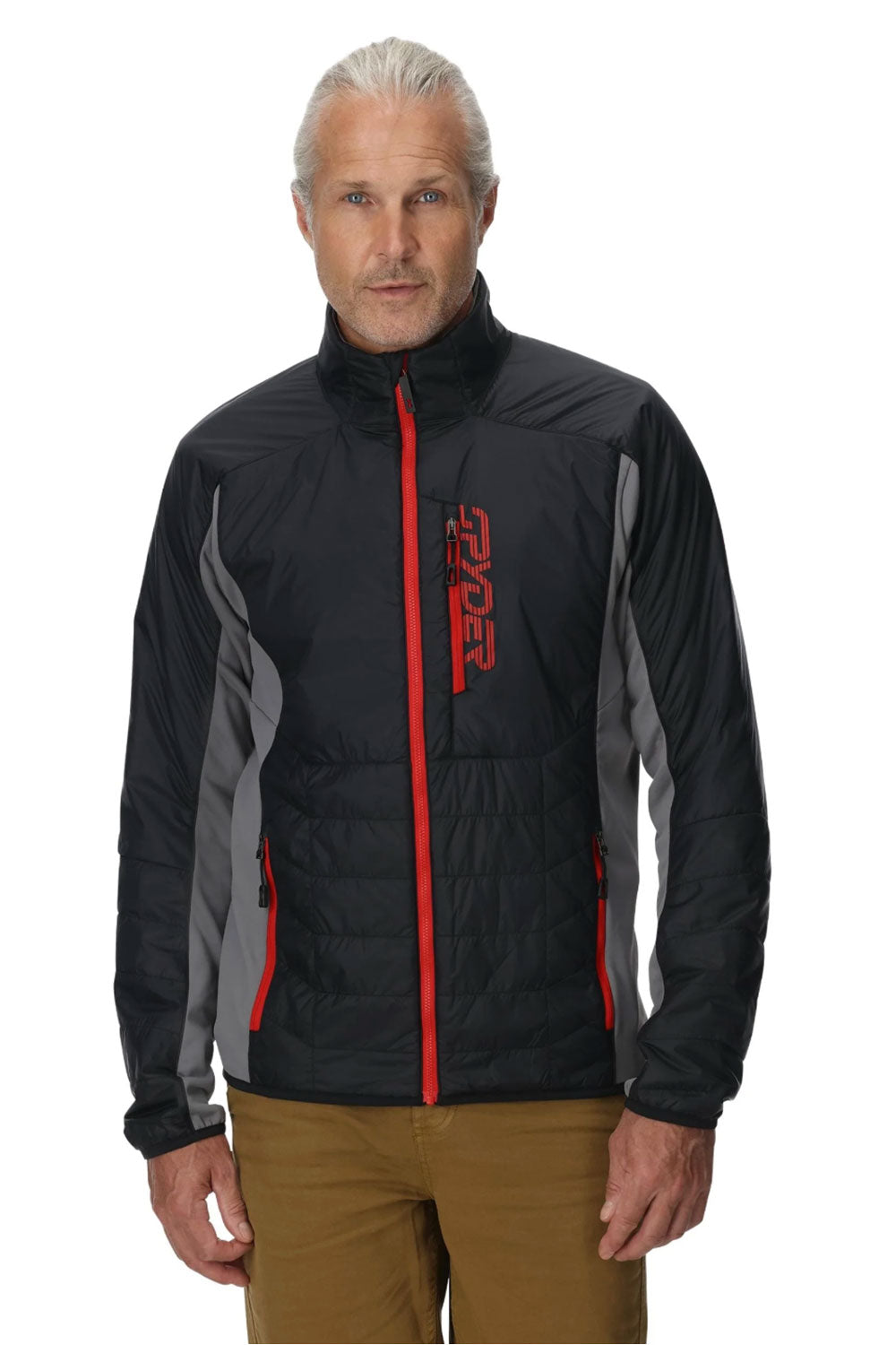 Man wearing a black and gray jacket with red accents on a white background