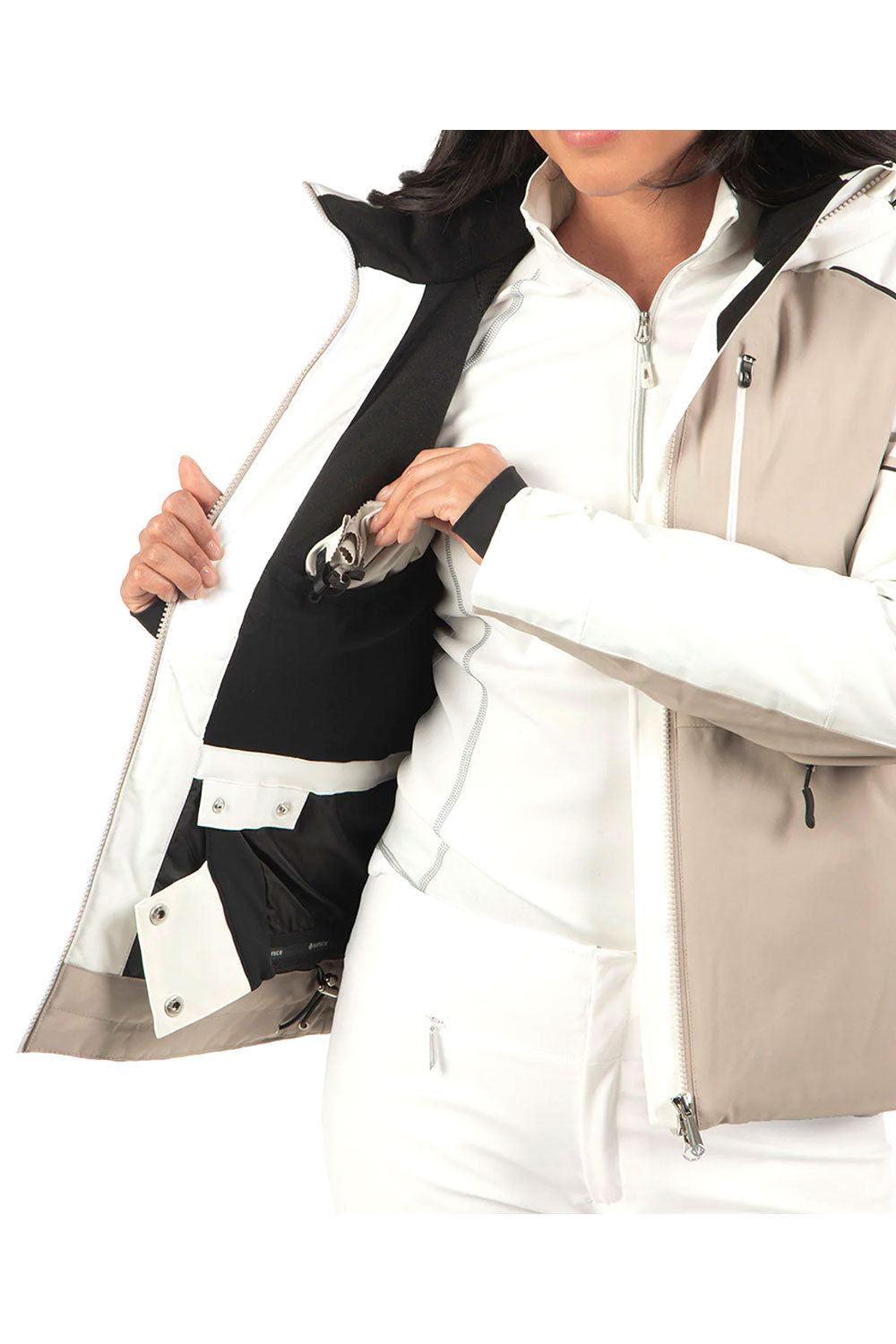 Person wearing a white and beige winter coat
