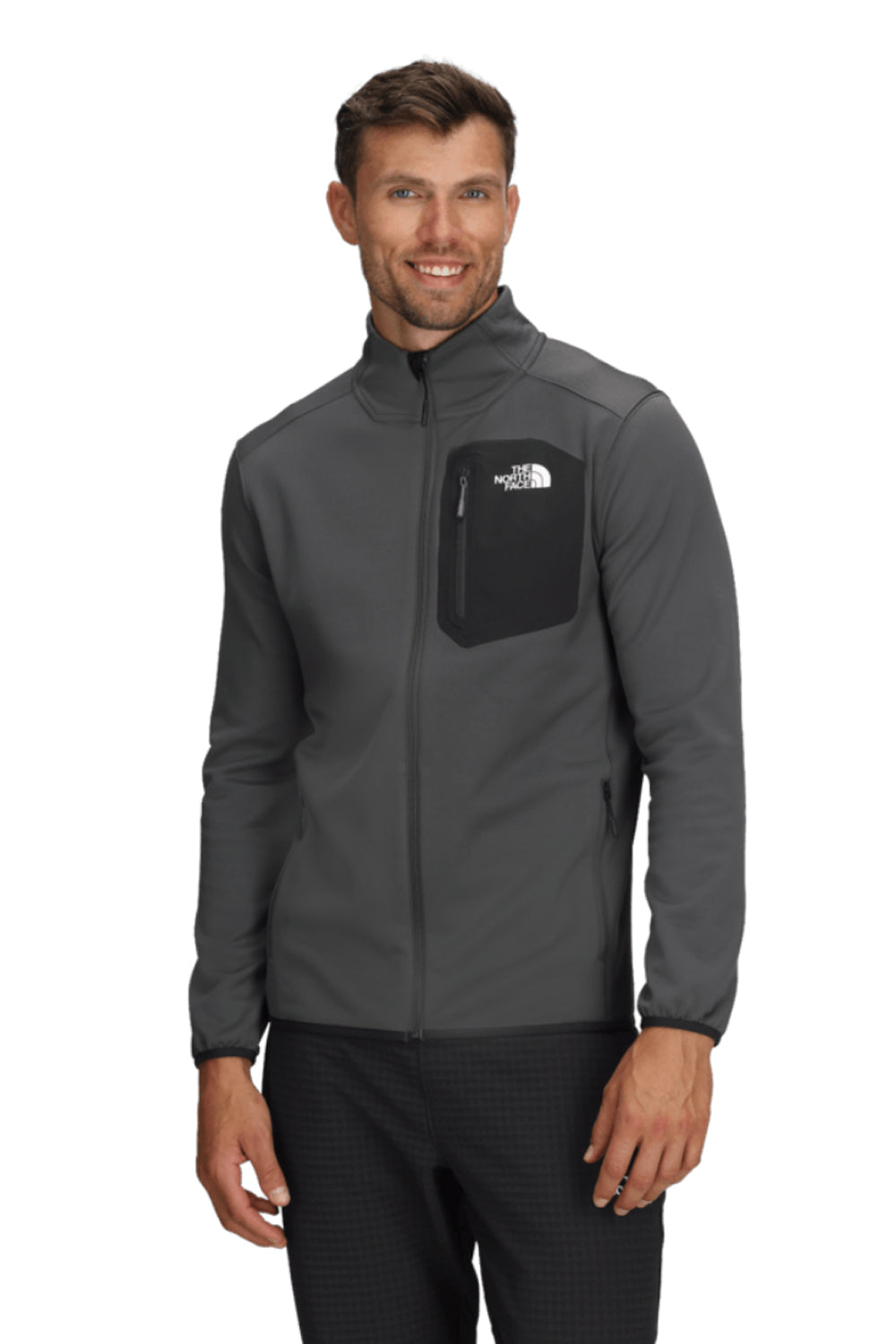Man wearing a gray jacket with a black pocket on a white background