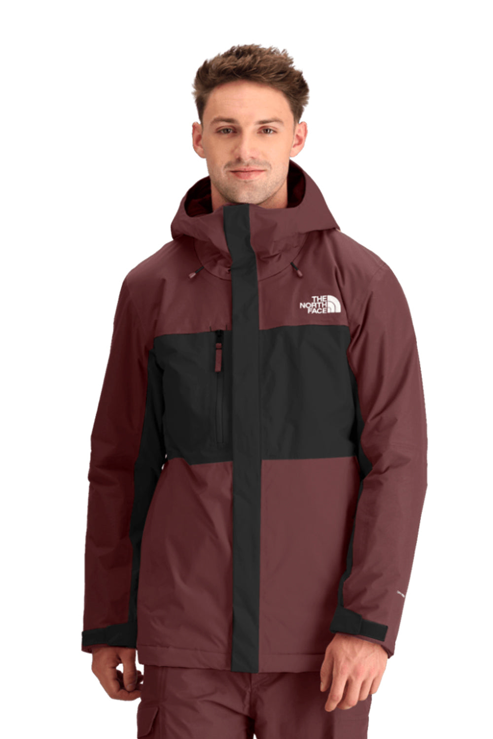 Man wearing a maroon and black jacket with The North Face logo on a white background