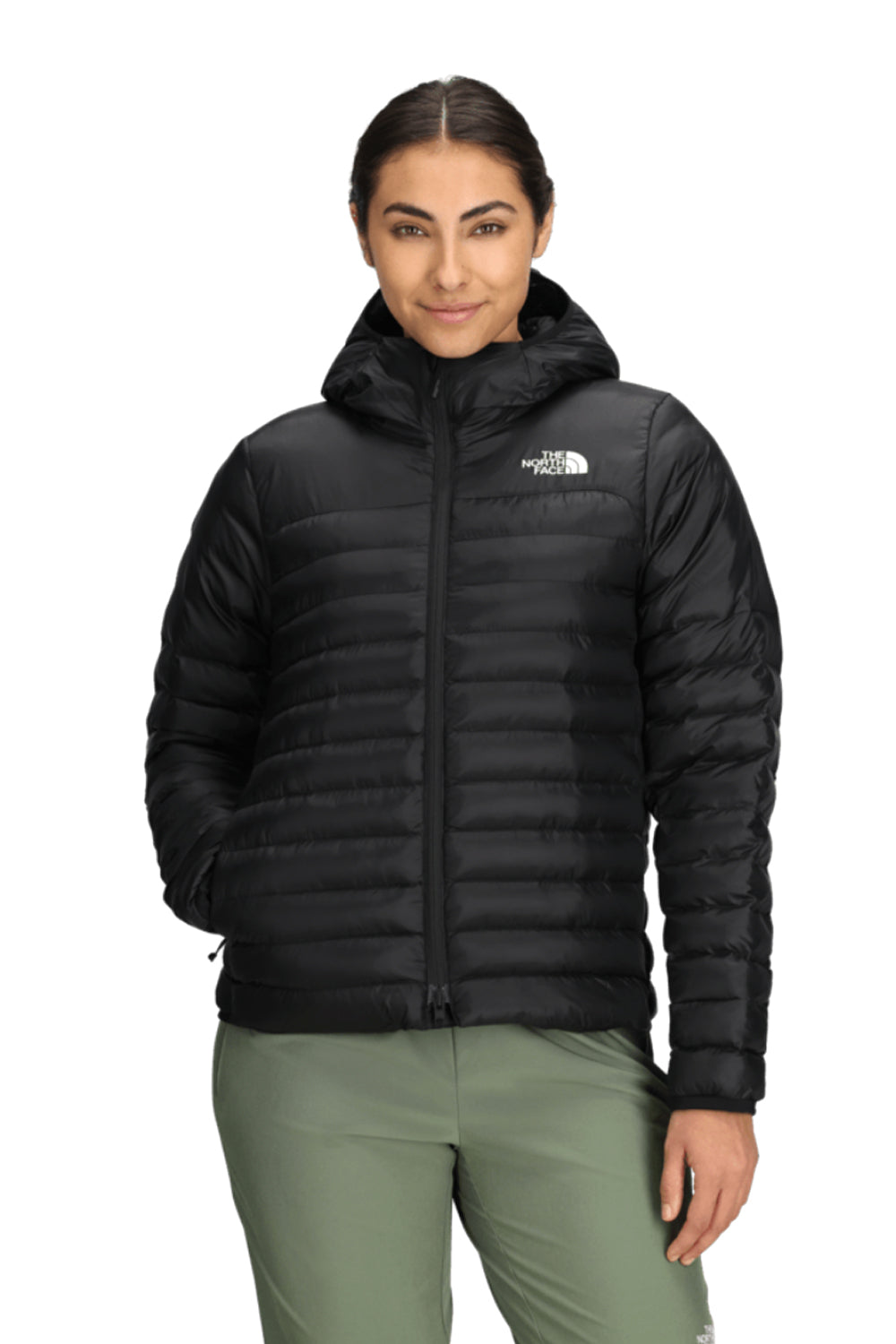 Person wearing a black The North Face jacket on a white background