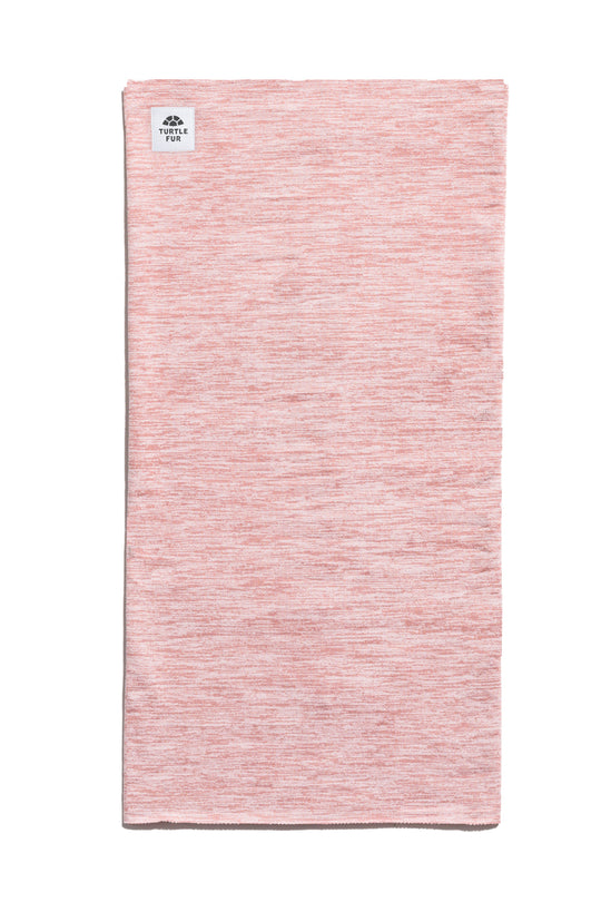 Pink neck gaiter with a brand label on a white background