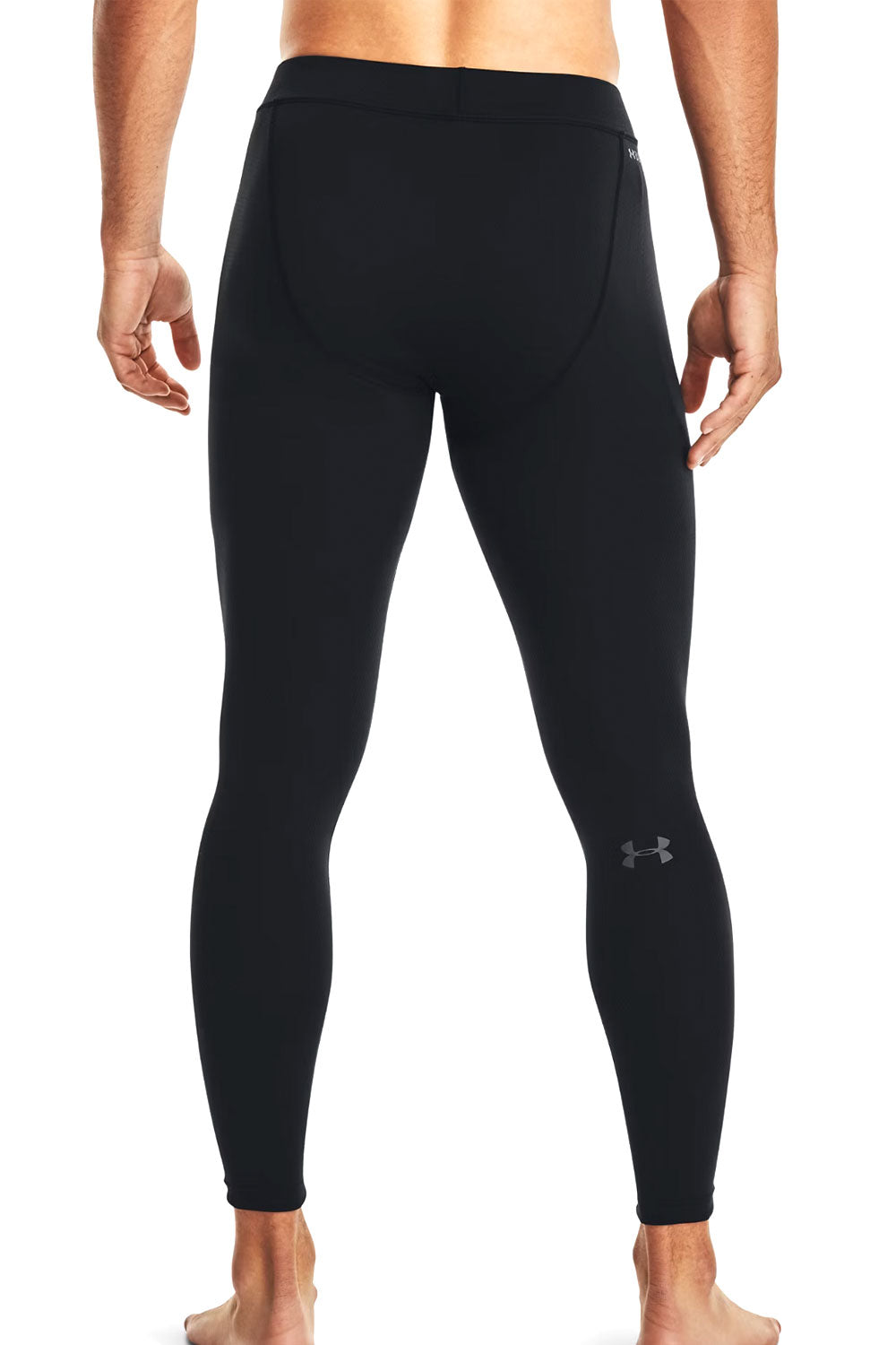 Black leggings with Under Armour logo on a white background