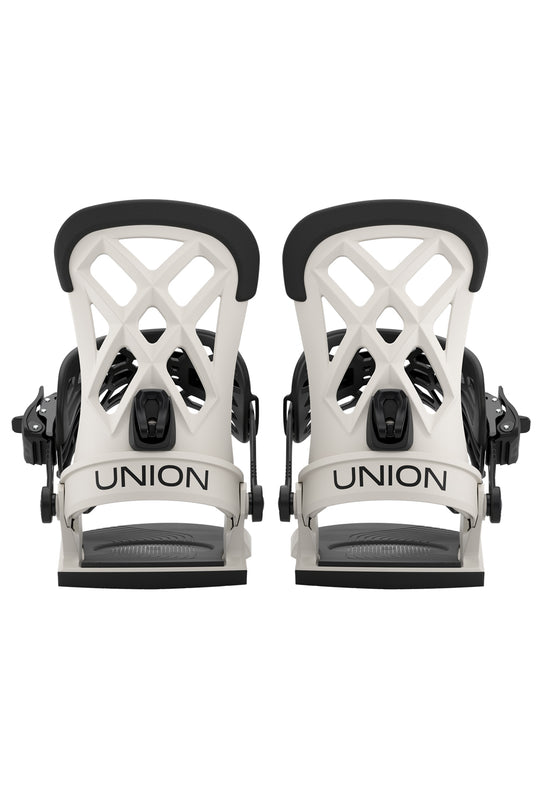 Two white snowboard bindings with black straps on a white background, featuring the Union brand.