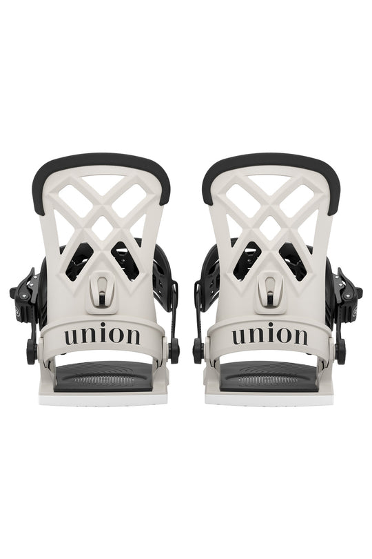 Pair of white and black union snowboard bindings on a white background