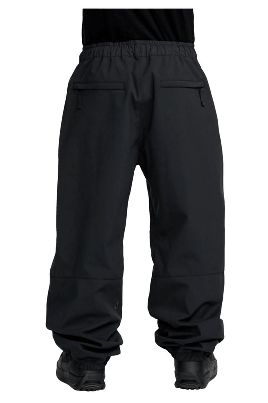 Black snow pants on a white background